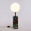 Image de SELETTI Lampe table LED Toiletpaper à motif serpent