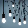 Image de SELETTI Suspension LED Maman noire 14 lampes satinée