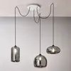 Image de Fabas Luce Suspension Fiona, gris-transparent, 3 lampes, verre