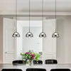 Image de Fabas Luce Suspension LED Lucille, à 4 lampes, gris fumé, CCT, variateur d'intensité