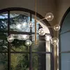 Image de Suspension Equinoxe d'IDEAL LUX, laiton/ambre, à 12 lampes