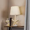 Image de ONLI Lampe à poser Stellina, abat-jour en tissu, décor étoile de mer