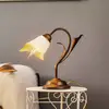 Image de ONLI Lampe à poser Lucrezia en bronze avec abat-jour fleuri
