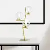 Image de miloox by Sforzin Lampe à poser Camely, 3 lampes, or brossé/clair, verre