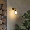 Image de FARO BARCELONA Applique d’extérieur Nahir laiton, anti-eau de mer