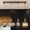 Image de Schuller Valencia Suspension Norma, 98 cm, à 4 lampes, noir/laiton, verre