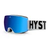 Image de Hysteresis Magnet Revol Lunettes de ski et snowboard avec verres toriques magnétiques interchangeables avec 2 verres inclus, monture blanche, lentille bleue, ruban blanc, 100% anti-buée UV400.