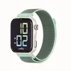 Image de SaveFamily SaveWatch Plus 2 | Montre Connectée pour Enfant avec Localisateur GPS, Appels, Vidéo, Whatsapp, Spotify, App Store - Cadran Blanc et Bracelet en Tissu Ocean
