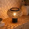 Image de Steinhauer Lampe à poser Bloeba, noire, tressage de bambou, Ø 22,5 cm