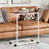 Image de vidaXL Table d'appoint avec roues Blanc 55x35x70 cm Bois d'ingénierie