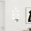 Image de vidaXL Miroir avec éclairage LED 60x30 cm Verre Ovale