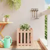 Image de vidaXL Jardinière avec design de clôture 50x50x50 cm Douglas massif