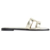 Image de Tommy Hilfiger pour femme. FW0FW09325 Mules en cuir doré métallisé (41), Plat, Aucun, Casuel