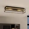 Image de EGLO Plafonnier Nohales, longueur 64 cm, noir/laiton, à 2 lampes.
