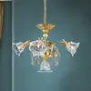 Image de Orion Suspension La Boheme, dorée, à 5 lampes, verre cristal