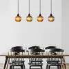 Image de Globo Suspension Zumba, vert/bronze/pétrole, 90 cm, 4 flammes, verre