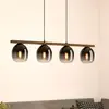 Image de EGLO Suspension Filago, quatre abat-jour en verre fumé