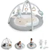 Image de INGENUITY Tapis déveil bébé évolutif - Petit Mouton - Arche de jeu amovible 5 jouets sensoriels peluche moutoncadeau bébé