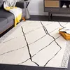 Image de Tapis Bohémien en Polyester Blanc/Noir 160 x 229 cm