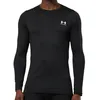 Image de T-shirt manches longues - UNDER ARMOUR - Fitted - Noir - Col arrondi - Coupe ajustée