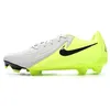Image de Chaussures de football Jaunes/Grises homme NIKE Phantom GX 2 Academy