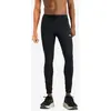 Image de Legging long New Balance Sleek Pocket noir pur - L