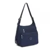 Image de Kono Sac de Voyage 31x13x24cm Sac à Dos à Bandoulière Imperméable et Antivol Convertible 3 en 1 Sac de Travail Léger Marine