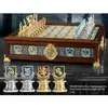 Image de Echiquier - NOBLE COLLECTION - Echiquier Quidditch - Pièces métal doré/argenté - Plateau 33x33 cm - Rangement intérieur