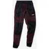 Image de Pantalon long Mountain Hardwear Polartec High Loft rouge foncé noir femme - XS