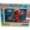 Image de Figurine Pop Rider Sesame Street Elmo Sur Tricycle Exclusif