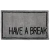 Image de Tapis déco texte en coton tufté 50x80cm