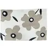 Image de Tapis déco floral en coton tufté