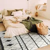 Image de Tapis tout doux losanges beige et gris foncé 120x170