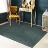 Image de Tapis en laine et coton vert foncé 120x170