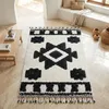 Image de Tapis berbère crème et gris à effet relief 120x170