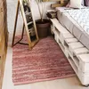 Image de Tapis en cuir tressé rose poudré 120x170