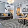 Image de Tapis effet laineux motif damier multicolore 133x170