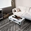 Image de Tapis toucher laineux imprimé motifs ethniques noir 133x190