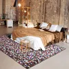 Image de Tapis en cuirs recyclés motif mosaïque marron multi 160x230