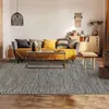 Image de Tapis en coton tissé et tressé marron 190x290