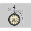 Image de Horloge ronde double face suspendue 27x38cm