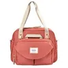 Image de Beaba, Sac A Langer Geneve Ll, Modulable, Grande Contenance, Rangements Multiples, Pochette Avant Amovible, Terracota