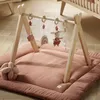 Image de Arche déveil bois avec 4 jouets - PETIT COEUR