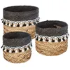 Image de Atmosphera - Lot de 3 paniers seagrass à pompons S : L 26 x H 20 cm M : L 30 x H 23 cm L : L 33 x H 25 cm Noir/beige