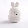 Image de MAÏKA Veilleuse en silicone lapin blanc recharge USB C 4 modes couleurs arc-en-ciel