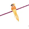 Image de Oiseau Perruche en plumes 13cm sur pince Orange