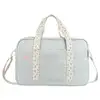 Image de Badabulle sac a langer bowling - grande contenance 20l - plan a langer et attaches-poussette inclus, gris