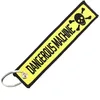 Image de CLJ - Porte-clés - DANGEROUS MACHINE - Jaune et Noir - Sécurité aviation - Urgence