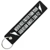 Image de CLJ - Porte-clés - NEVER RIDE FASTER - Noir et blanc - Voyage - Urgence