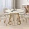 Image de Table à manger ronde fixe - IDMARKET - YUNA - Marbre et doré - 6 personnes - 110 cm